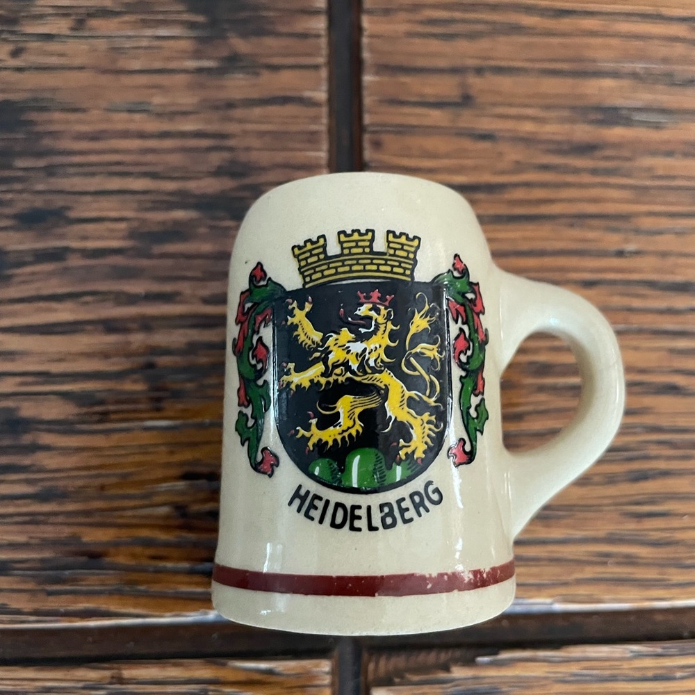 Cream and Red Ceramic Mug with Heraldic Design